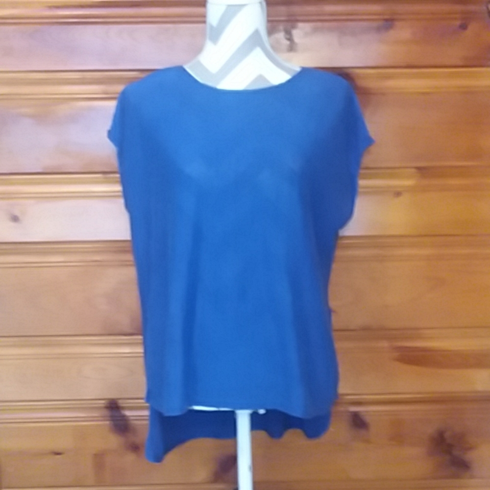 Eileen Fisher Blue knit short sleeved top.